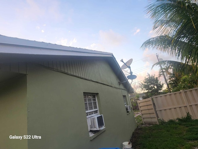 1441 W Central St, Lantana, FL 33462 - view of property exterior featuring stucco siding and cooling unit