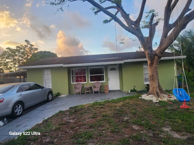 1441 W Central St, Lantana, FL 33462 - ranch-style house featuring stucco siding and roof with shingles