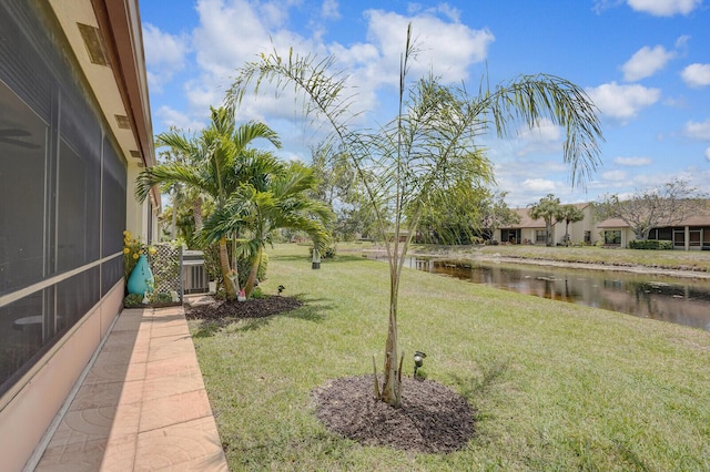 view of yard with a water view