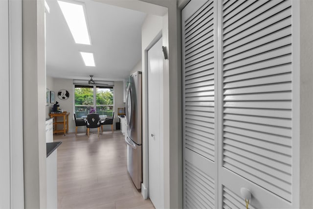 hall featuring light wood finished floors
