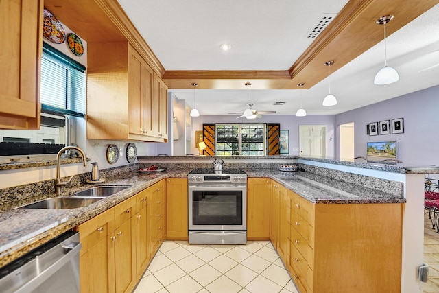 848 Johnson St, Hollywood, FL 33019 - kitchen with appliances with stainless steel finishes, a raised ceiling, a healthy amount of sunlight, and a sink