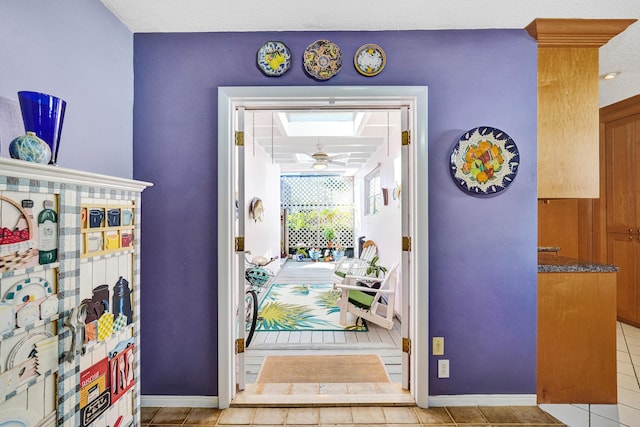 848 Johnson St, Hollywood, FL 33019 - entryway with light tile patterned floors and baseboards
