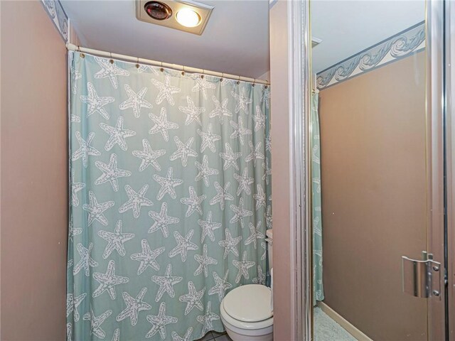 full bathroom with a shower with shower curtain