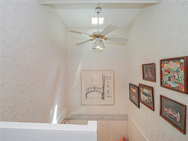 interior space featuring visible vents and ceiling fan
