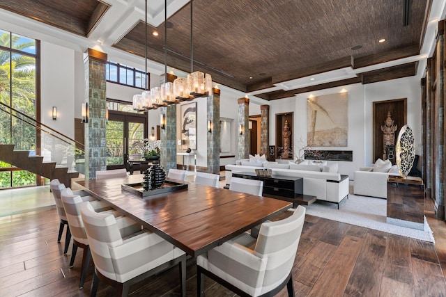 232 Bears Club Dr, Jupiter, FL 33477 - dining room with stairs, wood ceiling, a high ceiling, and dark wood-style floors