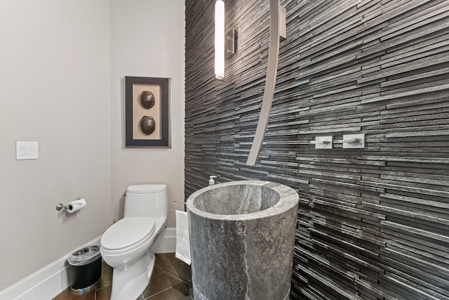 232 Bears Club Dr, Jupiter, FL 33477 - half bath featuring toilet and baseboards