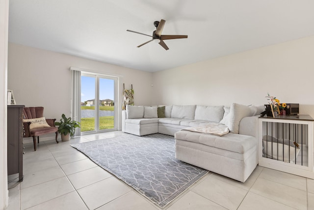 4235 Troon Pl, Fort Pierce, FL 34947 - living room with ceiling fan, a water view, and light tile patterned floors