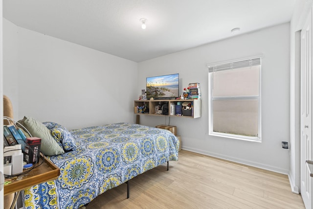 4235 Troon Pl, Fort Pierce, FL 34947 - bedroom featuring wood finished floors and baseboards