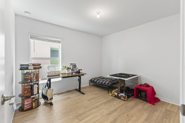 4235 Troon Pl, Fort Pierce, FL 34947 - miscellaneous room with wood finished floors, baseboards, and an office area