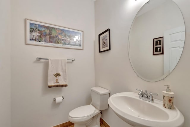 6805 Osage Cir, Greenacres, FL 33413 - half bath with a sink, baseboards, and toilet