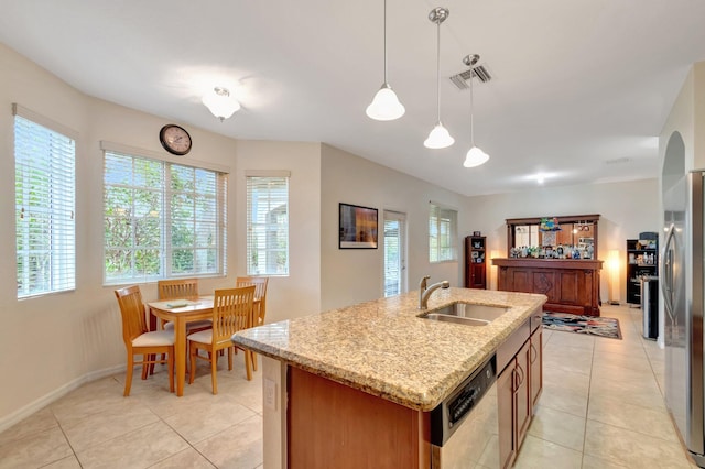 6805 Osage Cir, Greenacres, FL 33413 - kitchen with a sink, stainless steel appliances, light tile patterned floors, and an island with sink