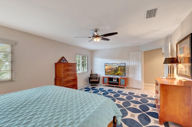 6805 Osage Cir, Greenacres, FL 33413 - bedroom featuring multiple windows, baseboards, and ceiling fan