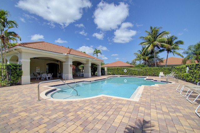 6805 Osage Cir, Greenacres, FL 33413 - community pool with fence and a patio area