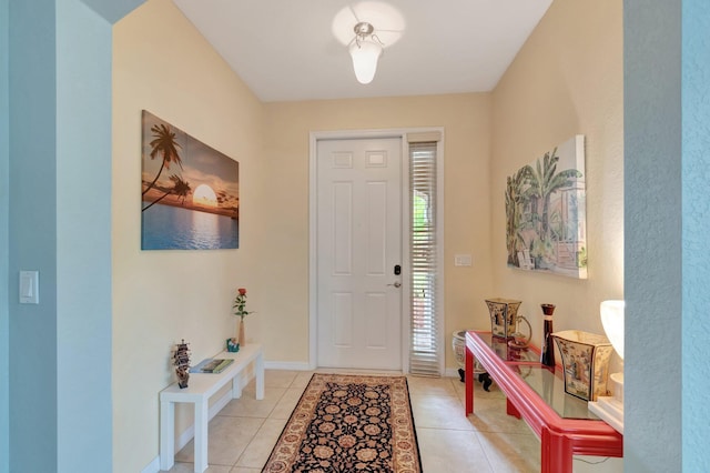 6805 Osage Cir, Greenacres, FL 33413 - foyer with light tile patterned floors and baseboards