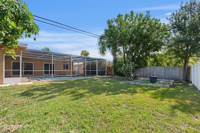 2650 NE 22nd St, Pompano Beach, FL 33062 - view of yard featuring a lanai