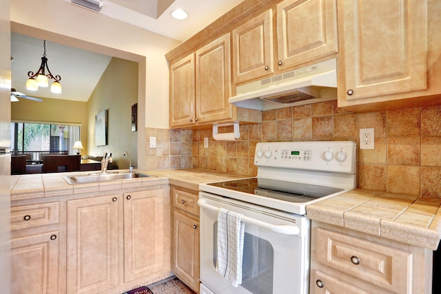 1961 SW 15th St Unit 82, Deerfield Beach, FL 33442 - kitchen with under cabinet range hood, electric stove, light brown cabinets, a sink, and tasteful backsplash