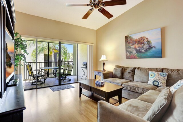 1961 SW 15th St Unit 82, Deerfield Beach, FL 33442 - living room featuring ceiling fan, wood finished floors, and high vaulted ceiling