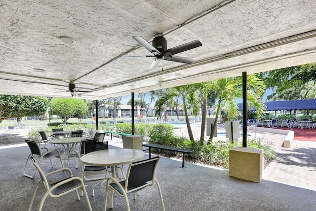 1961 SW 15th St Unit 82, Deerfield Beach, FL 33442 - view of patio / terrace with a ceiling fan and outdoor dining area