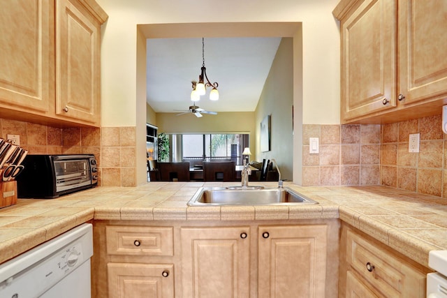 1961 SW 15th St Unit 82, Deerfield Beach, FL 33442 - kitchen with light brown cabinetry and a sink