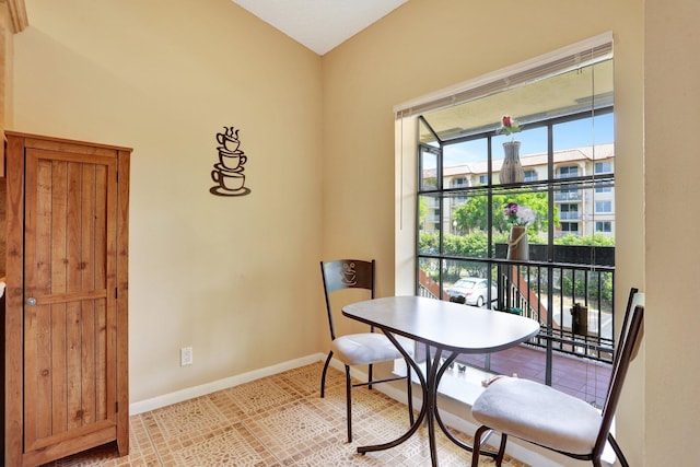 1961 SW 15th St Unit 82, Deerfield Beach, FL 33442 - dining area featuring baseboards