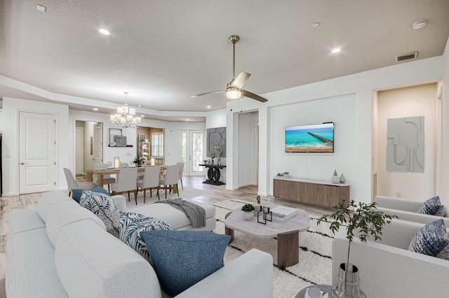 179 Tresana Blvd Unit 145, Jupiter, FL 33478 - living area with a chandelier, a textured ceiling, ceiling fan, recessed lighting, and light wood finished floors