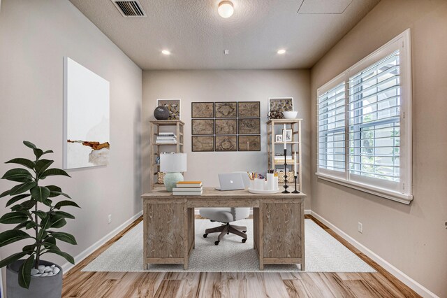 179 Tresana Blvd Unit 145, Jupiter, FL 33478 - office with wood finished floors, baseboards, a textured ceiling, and recessed lighting