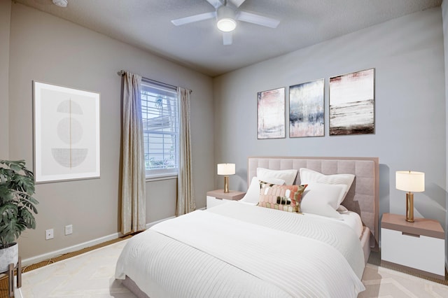 179 Tresana Blvd Unit 145, Jupiter, FL 33478 - bedroom featuring baseboards and ceiling fan