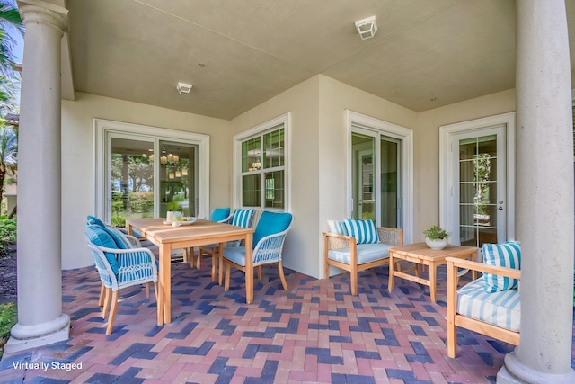 179 Tresana Blvd Unit 145, Jupiter, FL 33478 - view of patio featuring outdoor dining area