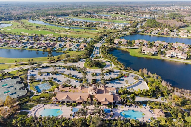 179 Tresana Blvd Unit 145, Jupiter, FL 33478 - aerial overview of property's location featuring nearby suburban area, a nearby body of water, a pool area, and a golf club