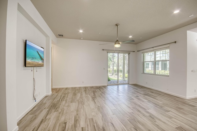 179 Tresana Blvd Unit 145, Jupiter, FL 33478 - unfurnished living room with recessed lighting, light wood-style flooring, baseboards, and ceiling fan
