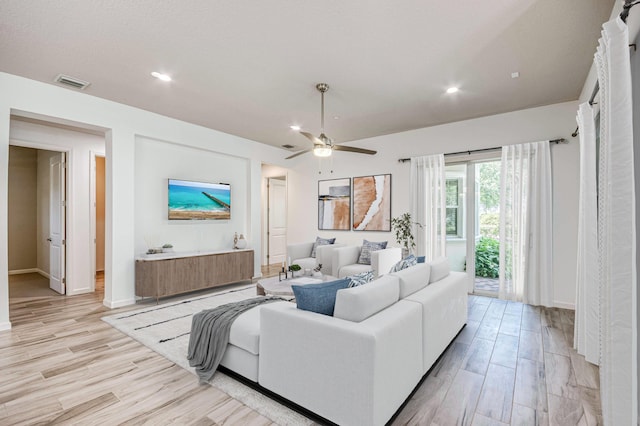 179 Tresana Blvd Unit 145, Jupiter, FL 33478 - living room with light wood-style flooring, ceiling fan, recessed lighting, and baseboards