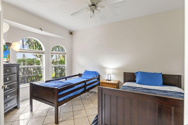 bedroom featuring ceiling fan and light tile patterned floors