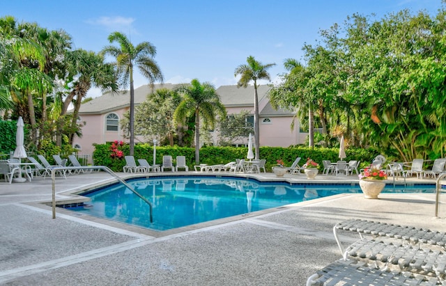 3003 Fairway Dr N, Jupiter, FL 33477 - community pool with a patio area