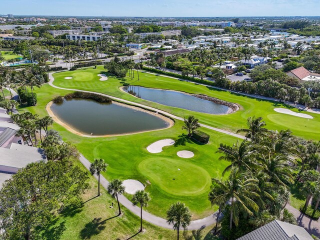 3003 Fairway Dr N, Jupiter, FL 33477 - aerial perspective of suburban area with a local golf course and a nearby body of water