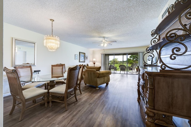 13403 Touchstone Pl Unit A-202, Palm Beach Gardens, FL 33418 - dining space featuring dark wood-style flooring, ceiling fan, a textured ceiling, and a chandelier