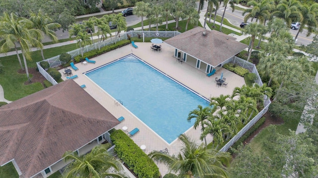 2616 E Community Dr, Jupiter, FL 33458 - community pool featuring fence and a patio