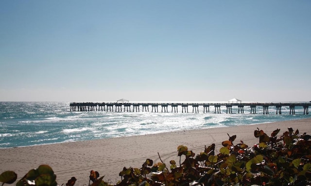 2616 E Community Dr, Jupiter, FL 33458 - water view with nearby beach and a pier