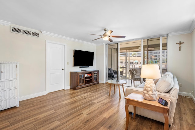 911 Gardenia Dr Unit 154, Delray Beach, FL 33483 - living room featuring baseboards, ceiling fan, visible vents, crown molding, and wood finished floors