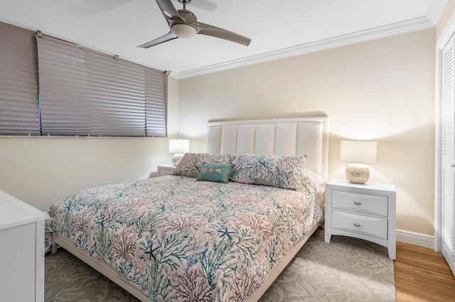 911 Gardenia Dr Unit 154, Delray Beach, FL 33483 - bedroom featuring crown molding, a ceiling fan, wood finished floors, and baseboards