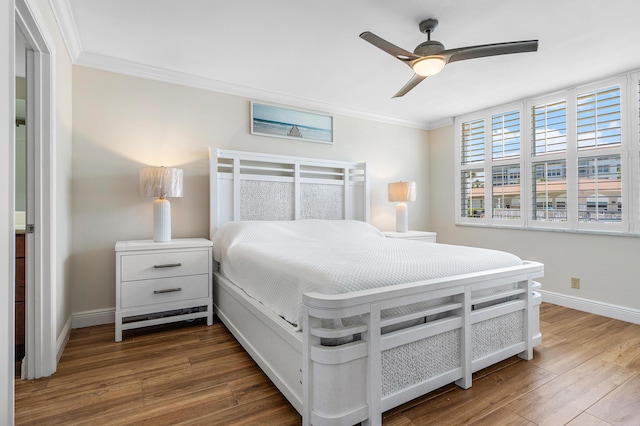 911 Gardenia Dr Unit 154, Delray Beach, FL 33483 - bedroom with baseboards, ornamental molding, ceiling fan, and wood finished floors