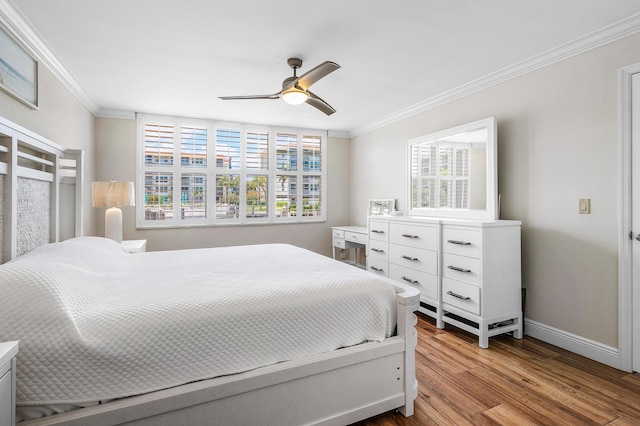 911 Gardenia Dr Unit 154, Delray Beach, FL 33483 - bedroom with baseboards, ornamental molding, ceiling fan, and wood finished floors