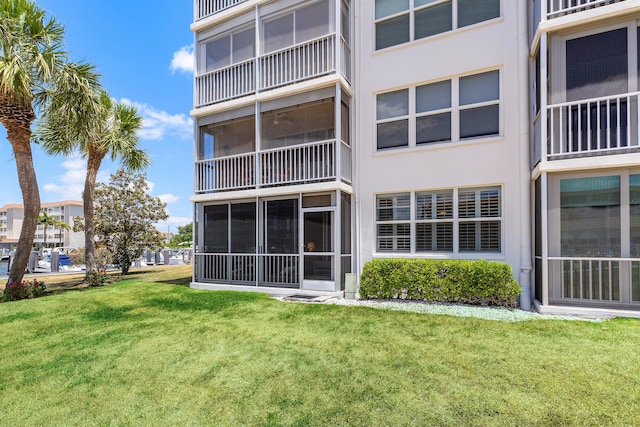 911 Gardenia Dr Unit 154, Delray Beach, FL 33483 - exterior space with a yard and stucco siding