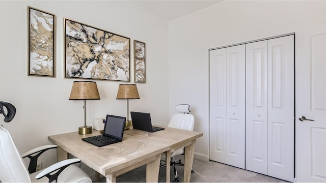 home office featuring light colored carpet