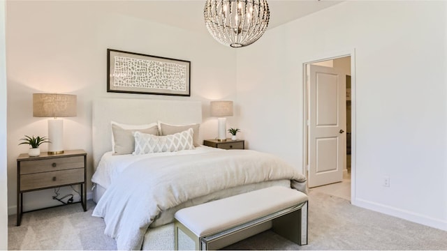 bedroom with baseboards, a notable chandelier, and light colored carpet