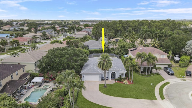 birds eye view of property with a residential view