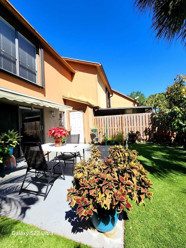 view of patio / terrace with fence
