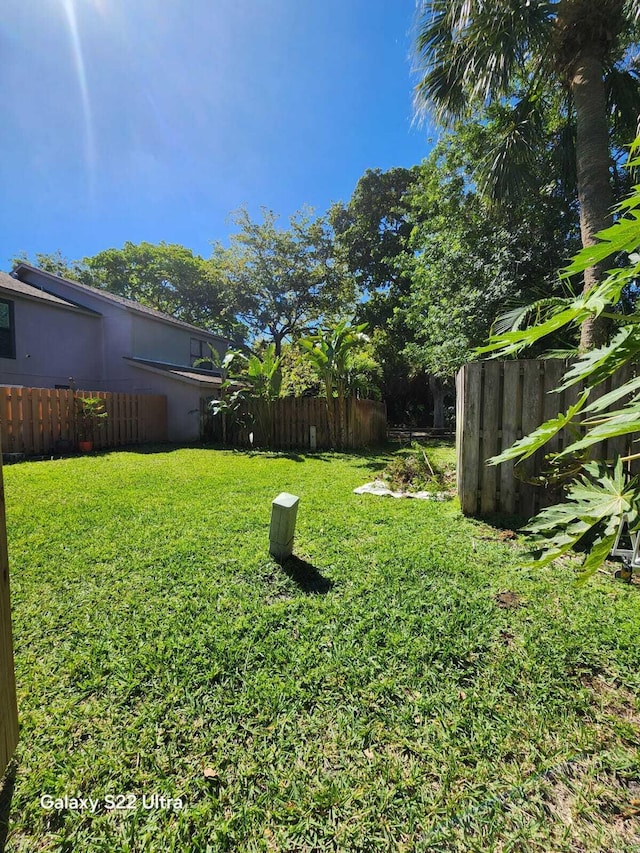 view of yard with fence