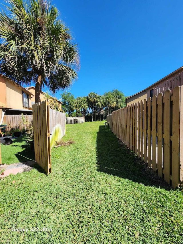 view of yard featuring fence
