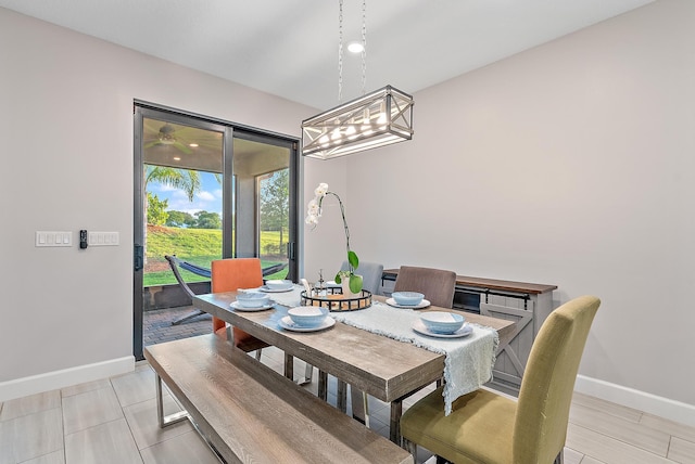 656 SE Villandry Way, Port Saint Lucie, FL 34984 - dining room featuring baseboards