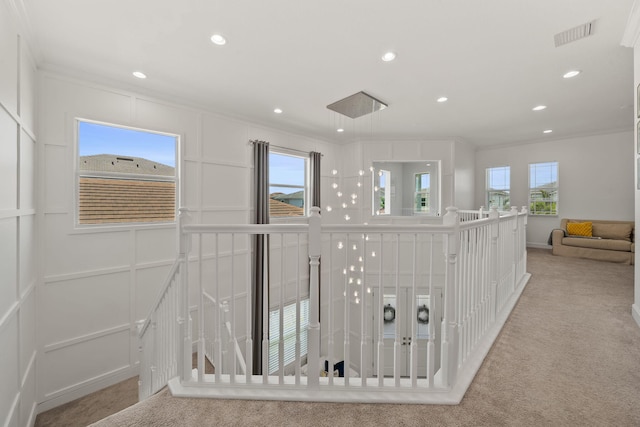 5651 Macoon Way, Westlake, FL 33470 - hallway featuring an upstairs landing, light carpet, crown molding, plenty of natural light, and recessed lighting